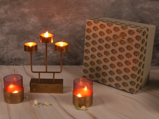 Dohar Festive Gift hamper with Brass Plated Assorted Tea Light stand and Set of 2 Votive with Purple Glass